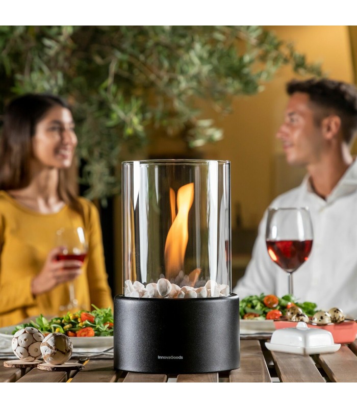 Réflexion durant une seconde Heatfir – cheminée de table noire au bioéthanol InnovaGoods