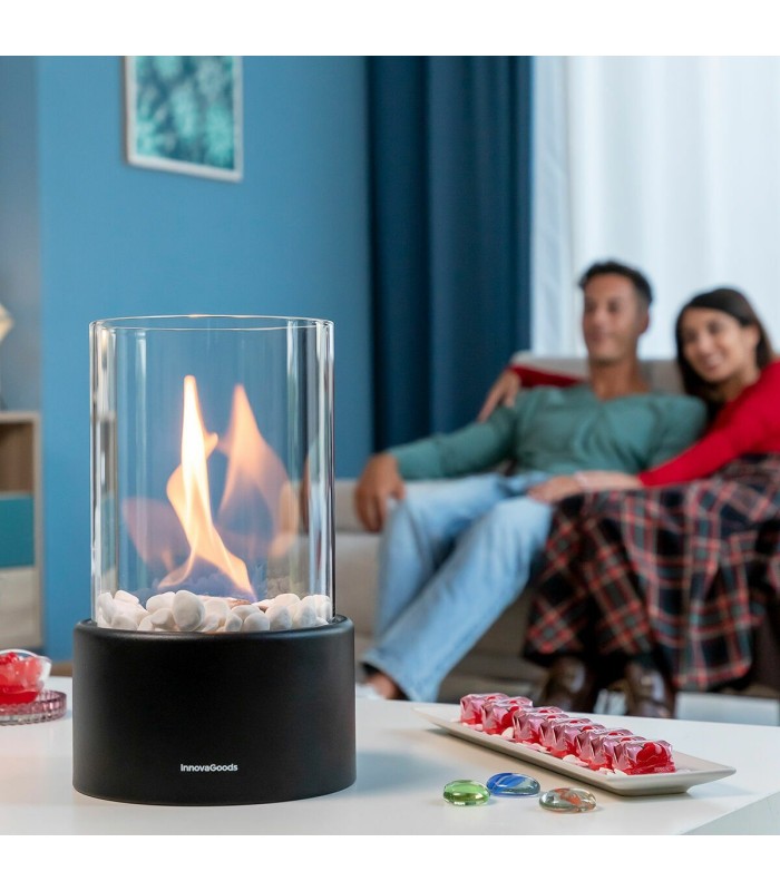 Réflexion durant une seconde Heatfir – cheminée de table noire au bioéthanol InnovaGoods